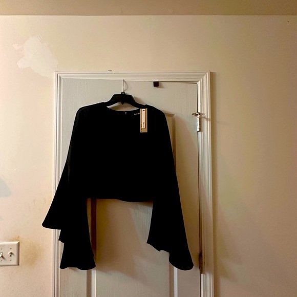 Elegant Black Peplum Sleeve Top - Picture 2 of 3